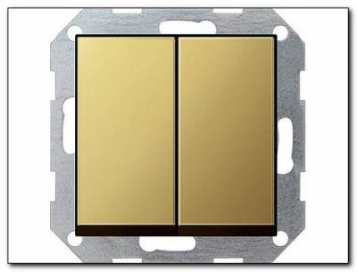 Łącznik przyciskowy świecznikowy System 55 mosiądz